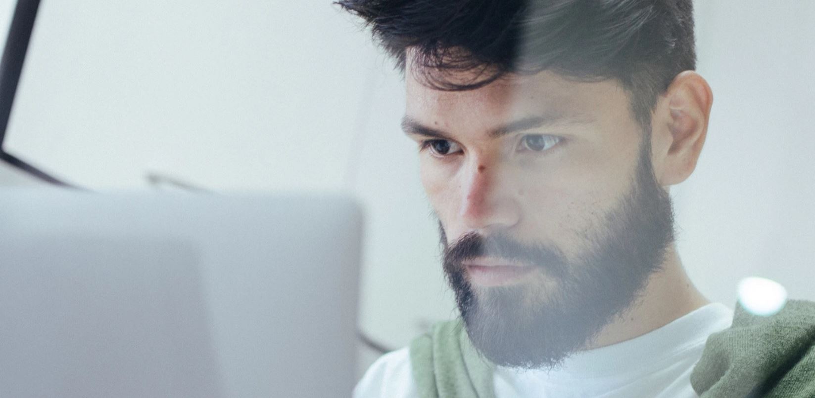 Technology professional working at a computer