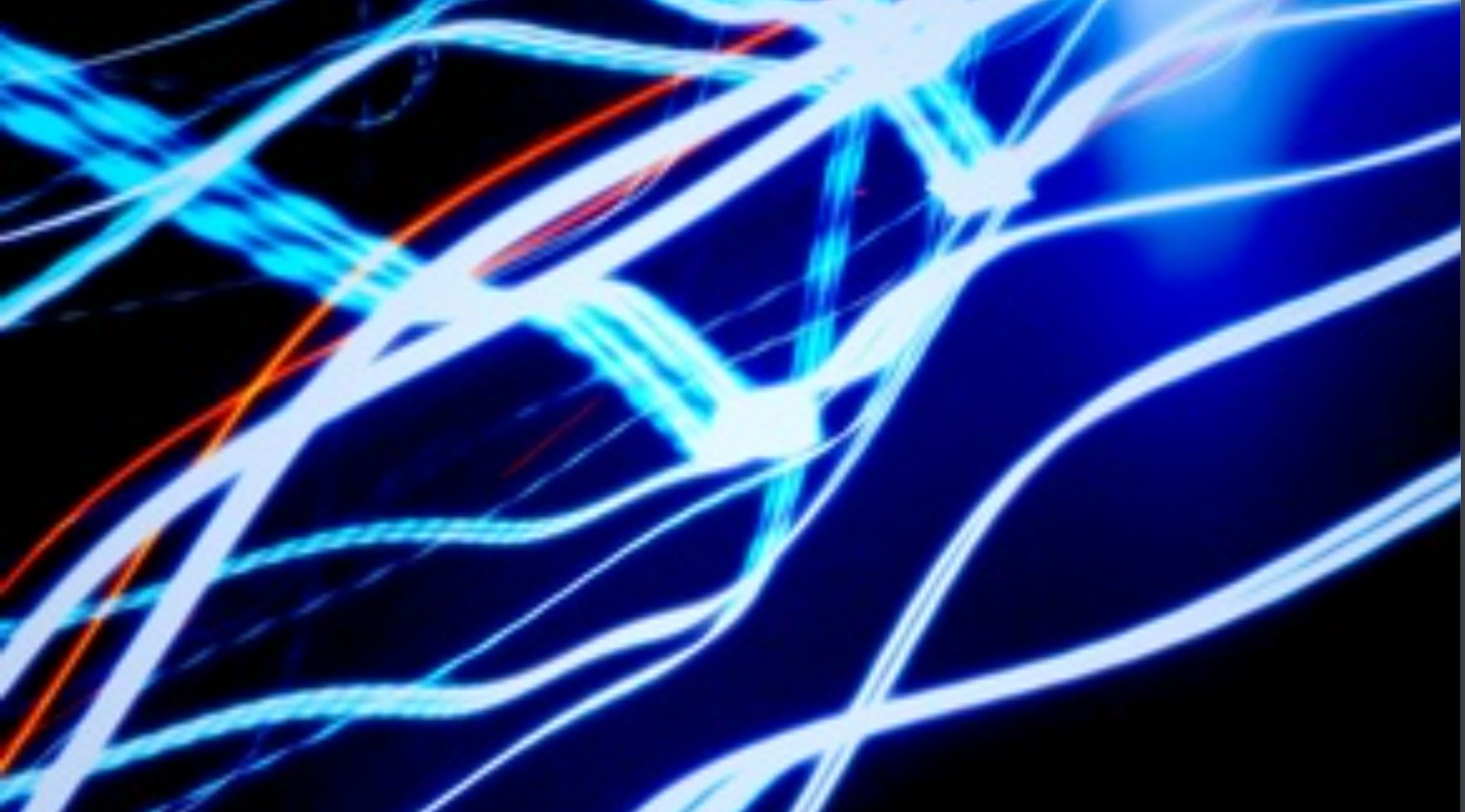 Abstract blue and white light trails crossing a dark background